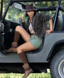 Woman wears Juzo Adventure in cocoa and gets out of an off-road vehicle