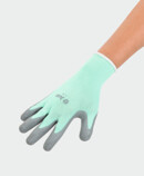 Woman wearing Juzo special glove 